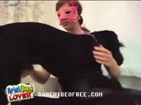 Masked babe getting her holes fucked by dog